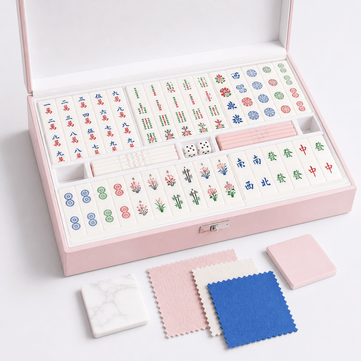 Pink Mahjong case with coordinated tiles, racks, dice, and fabric color samples
